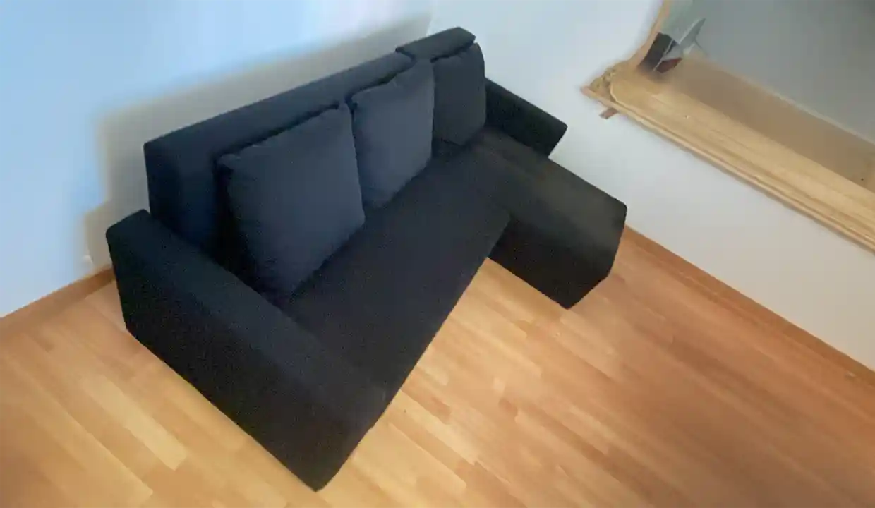 Sofa de pana oscuro
